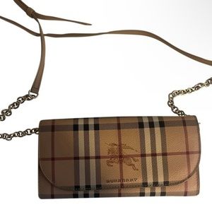 Authentic Burberry cross body! no damage, like new w/ tags and duffle bag.